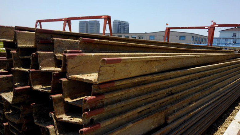 Surface treatment of steel sheet piles