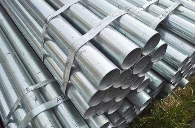 What precautions should be taken when storing galvanized steel pipes during rainy seasons to prevent corrosion and rust?